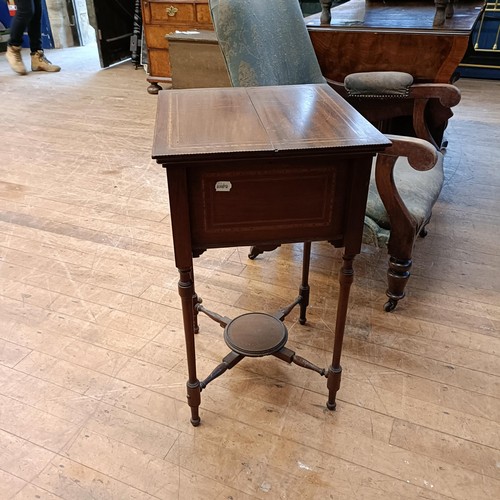 1055 - A mahogany framed armchair, and a work box (2)