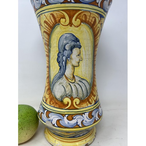 891 - A 19th century Delft albarello, decorated portrait, 32 cm high