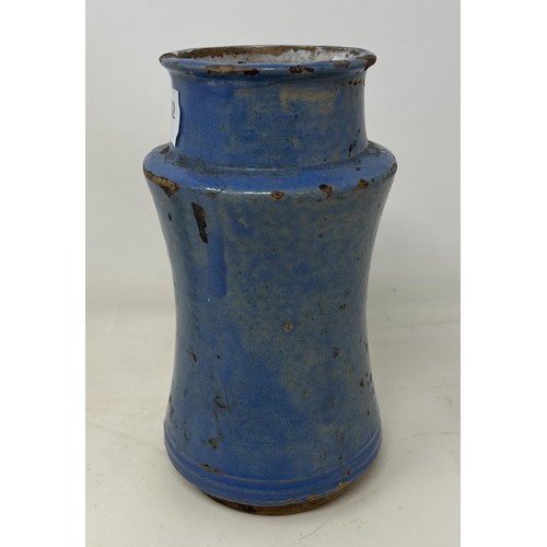 892 - A probably Spanish blue glazed albarello, 18 cm high