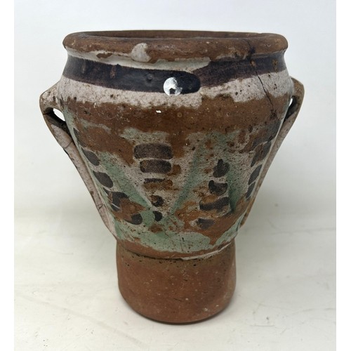 895 - An 18th century Spanish pottery mortar, 18 cm high