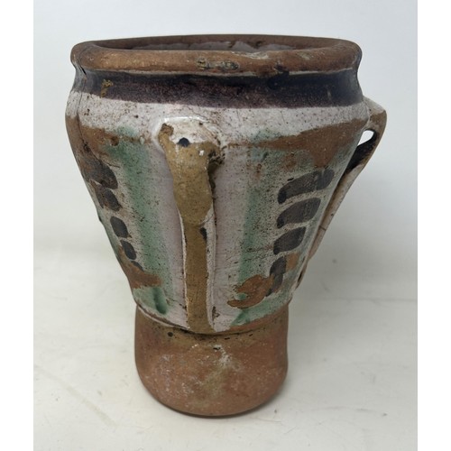 895 - An 18th century Spanish pottery mortar, 18 cm high