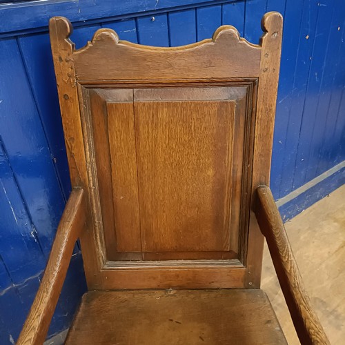 1050 - An oak Wainscot type armchair