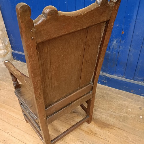 1050 - An oak Wainscot type armchair