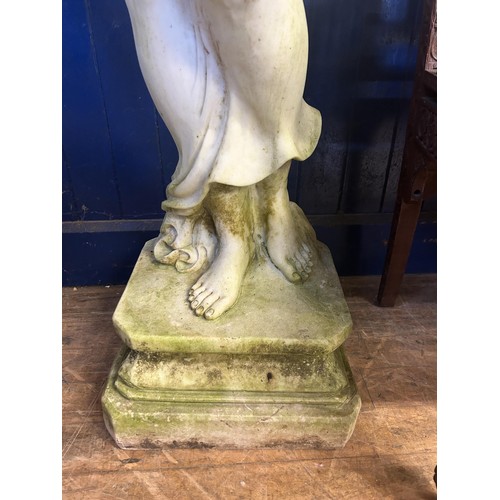 1082 - A garden statue of a woman in a classical pose, resin, 160 cm high