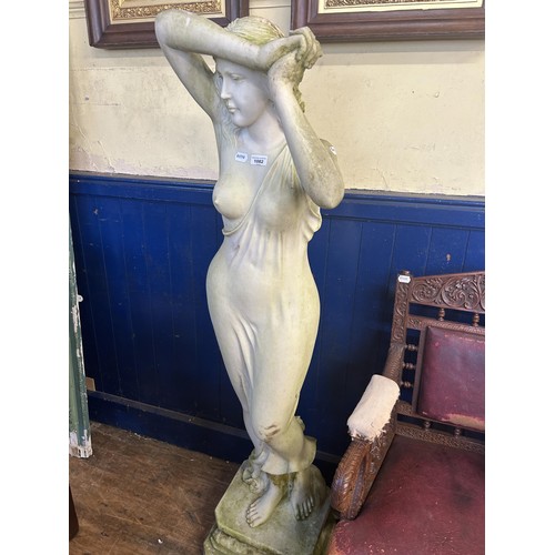 1082 - A garden statue of a woman in a classical pose, resin, 160 cm high