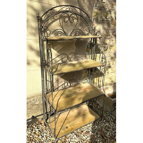 1088 - A metal four tiered plant stand, 120 cm high