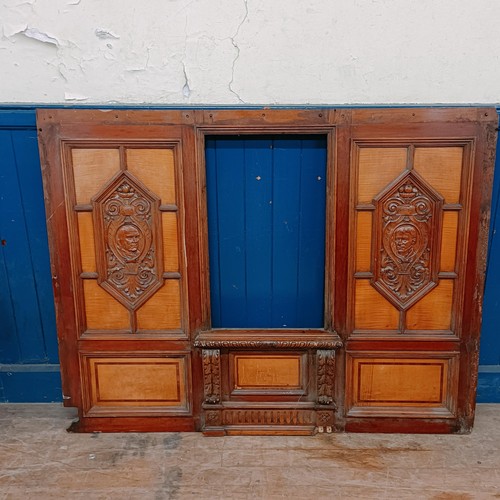 1014 - Seven mahogany walnut satinwood carved panels, reportedly from a cruise ship, carved with crest, por... 