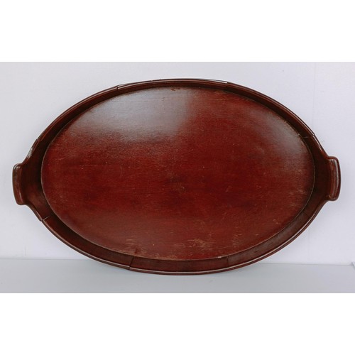 1095 - A 19th century mahogany and brass bound oval tray, 60 cm wide