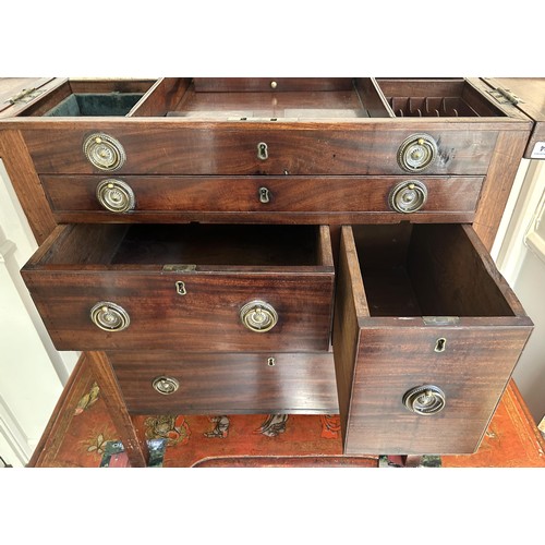 1004 - An unusual 19th century naval officer's campaign commode mode stand, with a folding top to reveal a ... 