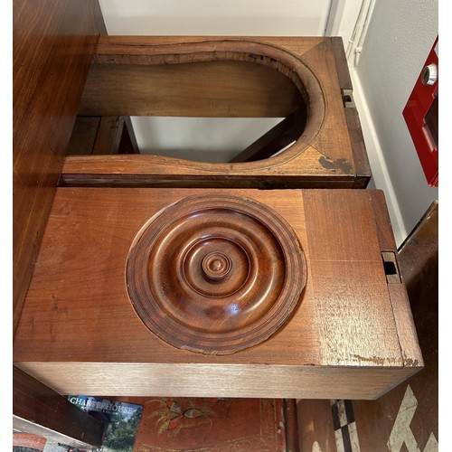 1004 - An unusual 19th century naval officer's campaign commode mode stand, with a folding top to reveal a ... 