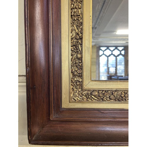 1008 - A pair of walnut and gilt framed wall mirrors, each 62 x 53 cm (2)