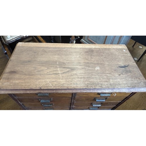 1043 - An unusual Canadian walnut filing cabinet, having eight drawers, with brass plaque reading Hart &... 