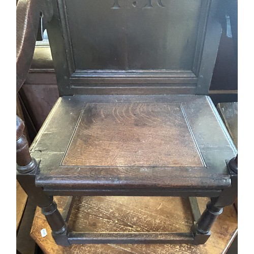 1072 - An oak Wainscot type armchair