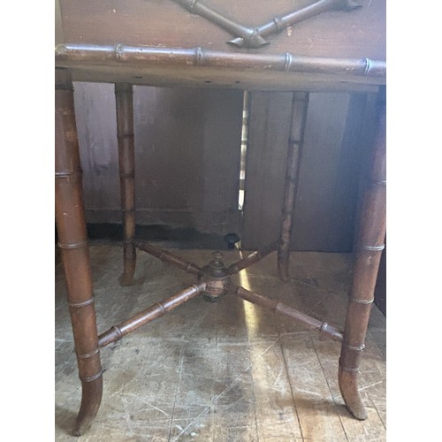 1073 - An unusual early 20th century, pine and bamboo octagonal centre table, 88 cm wide