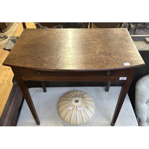 1078 - A mahogany bow front side table, with a single frieze drawer, 78 cm wide