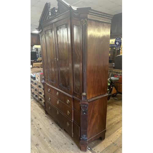 953 - An 18th century walnut armoire, with an architectural pediment, 170 cm wide