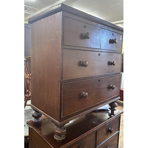 1026 - A mahogany chest, having two short and two long drawers, 99 cm wide, and two cast metal standard lam... 