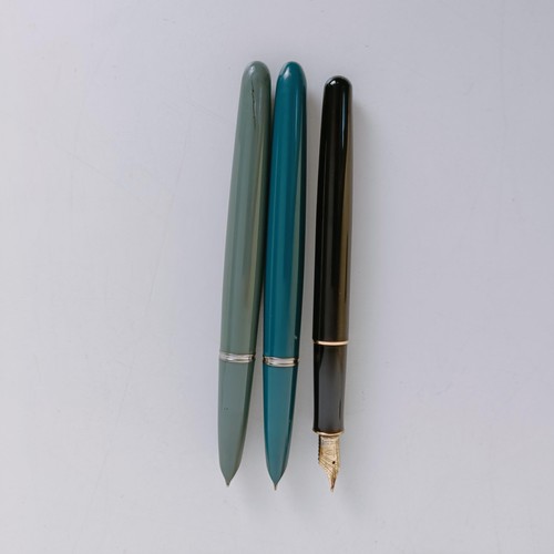 917 - A Parker fountain pen, two other fountain pens, two watch cases, five cut glass bottles with silver ... 