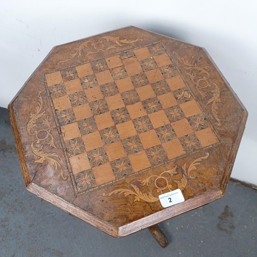 2 - A Victorian walnut work table, top inset with chess board, in need of extensive restoration, 45 cm w... 