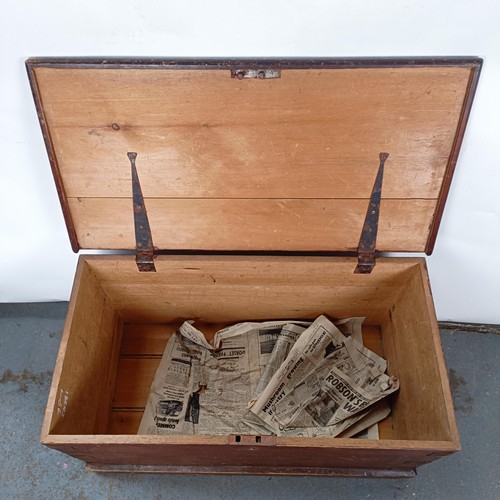 6 - A Victorian stained pine trunk, with metal mounts, 84 cm wide