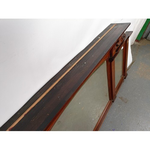 12 - A mahogany framed overmantel mirror, converted from the back of sideboard, 96 x 206 cm