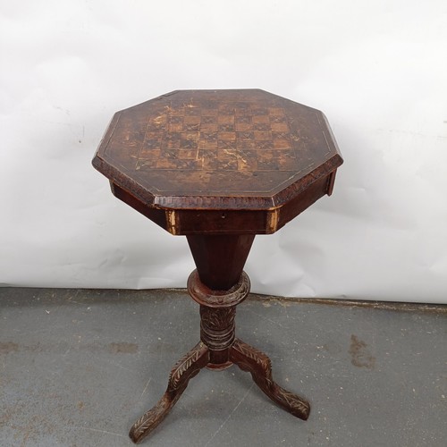 13 - A Victorian walnut work table, top inset with a chess board, 42 cm wide