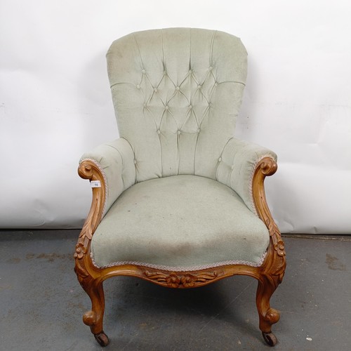 16 - A Victorian mahogany framed button back armchair, in need of extensive restoration