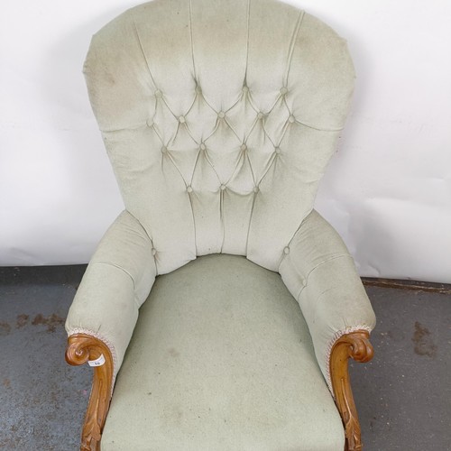 16 - A Victorian mahogany framed button back armchair, in need of extensive restoration