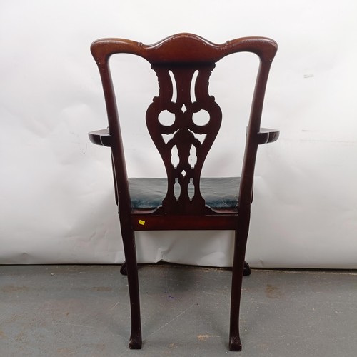 19 - A mahogany Chippendale style armchair, with a padded seat