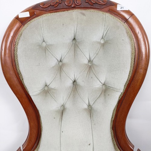 21 - A Victorian walnut framed nursing chair