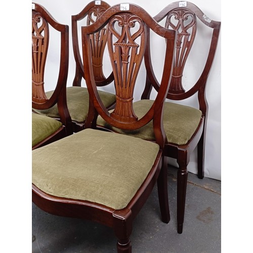 24 - Four mahogany chairs, with drop in seats