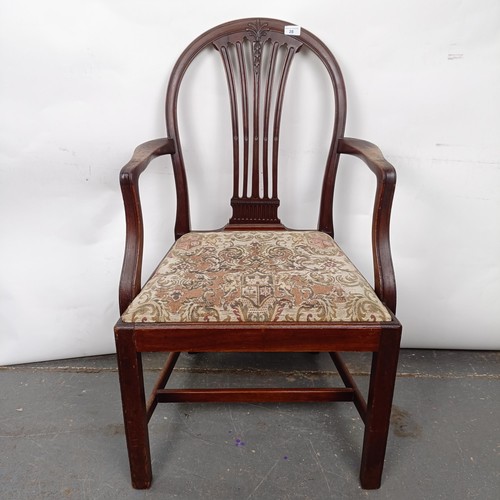 28 - A mahogany armchair, with a drop in seat