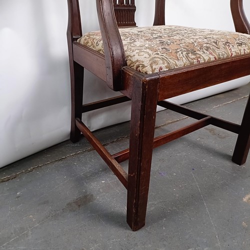 28 - A mahogany armchair, with a drop in seat