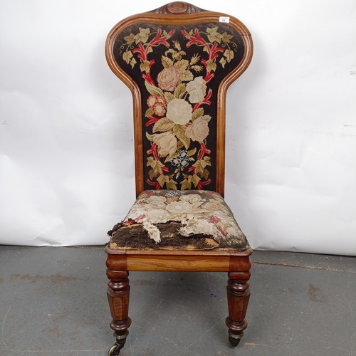 29 - A 19th century Continental nursing chair, with a carved top rail, with a tapestry back and seat, 105... 