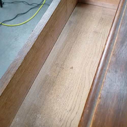 35 - An Edwardian oak dressing chest, 107 cm wide