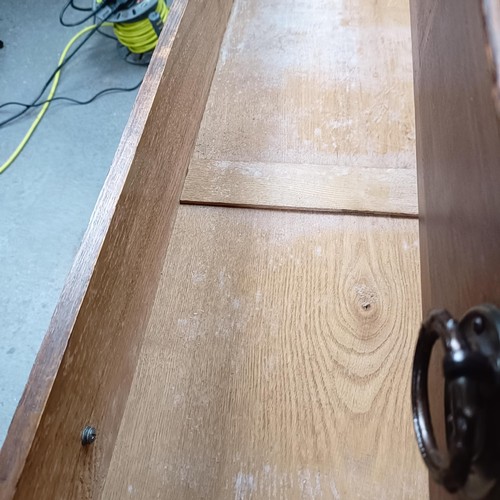 35 - An Edwardian oak dressing chest, 107 cm wide