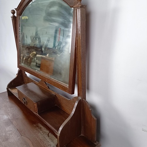 35 - An Edwardian oak dressing chest, 107 cm wide