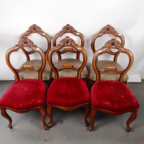 38 - A set of six Victorian mahogany framed dining chairs, with carved top rails, padded seats and cabrio... 