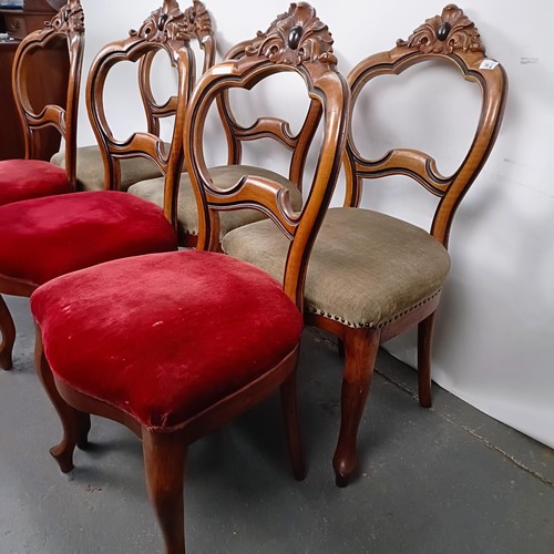 38 - A set of six Victorian mahogany framed dining chairs, with carved top rails, padded seats and cabrio... 