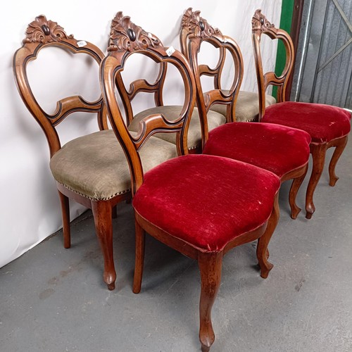 38 - A set of six Victorian mahogany framed dining chairs, with carved top rails, padded seats and cabrio... 