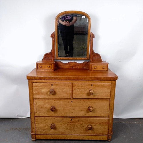 39 - A Victorian mahogany dressing chest, with a mirrored back above base with two short and two long dra... 