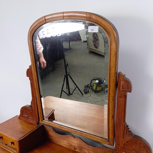 39 - A Victorian mahogany dressing chest, with a mirrored back above base with two short and two long dra... 