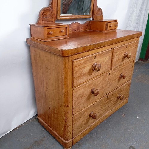 39 - A Victorian mahogany dressing chest, with a mirrored back above base with two short and two long dra... 