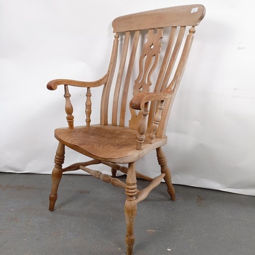 41 - A Victorian Windsor style kithcen armchair