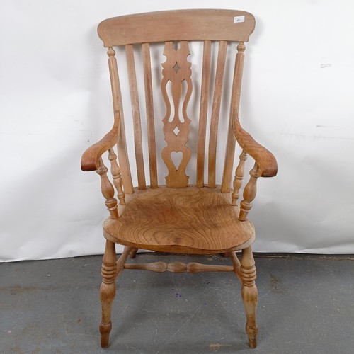 41 - A Victorian Windsor style kithcen armchair