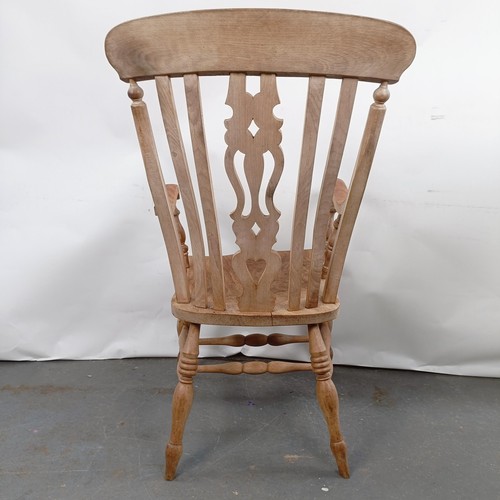 41 - A Victorian Windsor style kithcen armchair