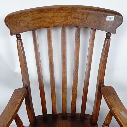 43 - A Victorian Windsor style kitchen armchair