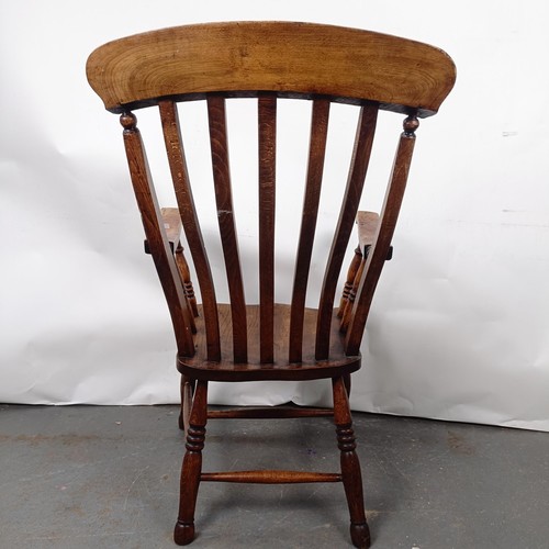 43 - A Victorian Windsor style kitchen armchair