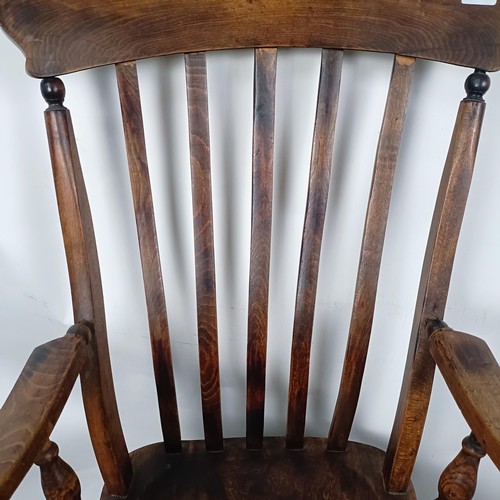 44 - A Victorian Windsor style kithcen armchair