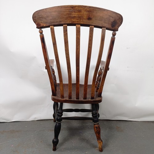 44 - A Victorian Windsor style kithcen armchair